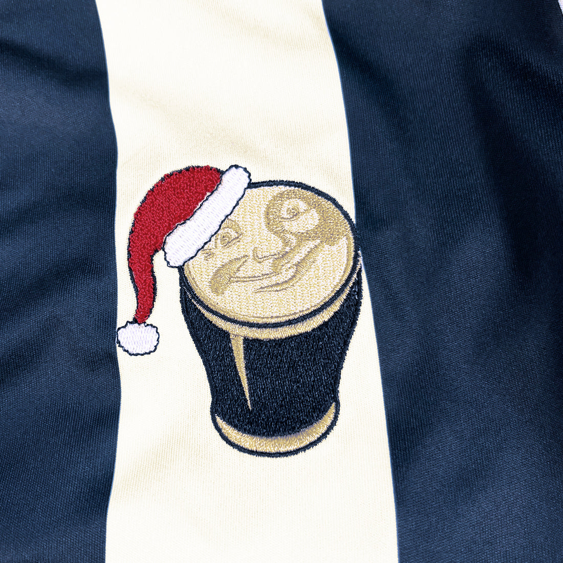 Embroidered Guinness pint with Santa hat detail on striped jersey