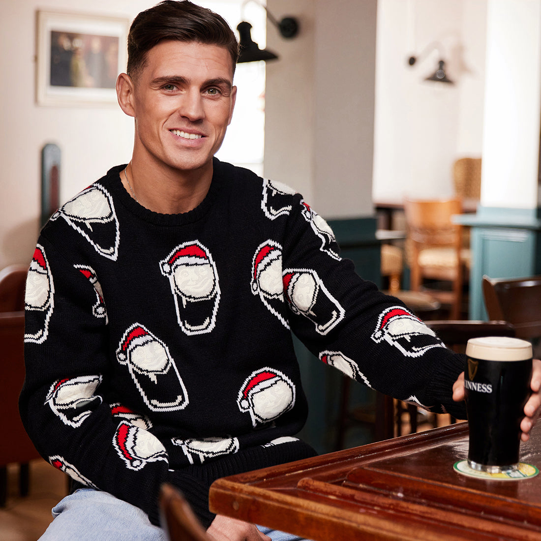 Men's Guinness Christmas Jumper with festive pint design